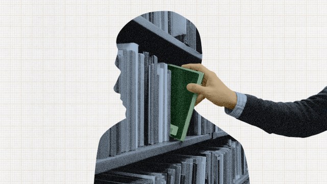 A hand pulls a green book from a library shelf, surrounded by tsundoku—the gentle art of collecting more books than you can read—with the silhouette of a person formed from the bookshelf and books.