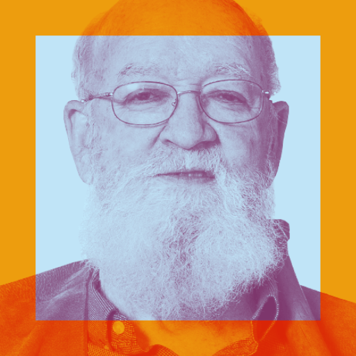 Elderly man with glasses and a white beard, photographed in cool tones with an orange transparent square overlay.