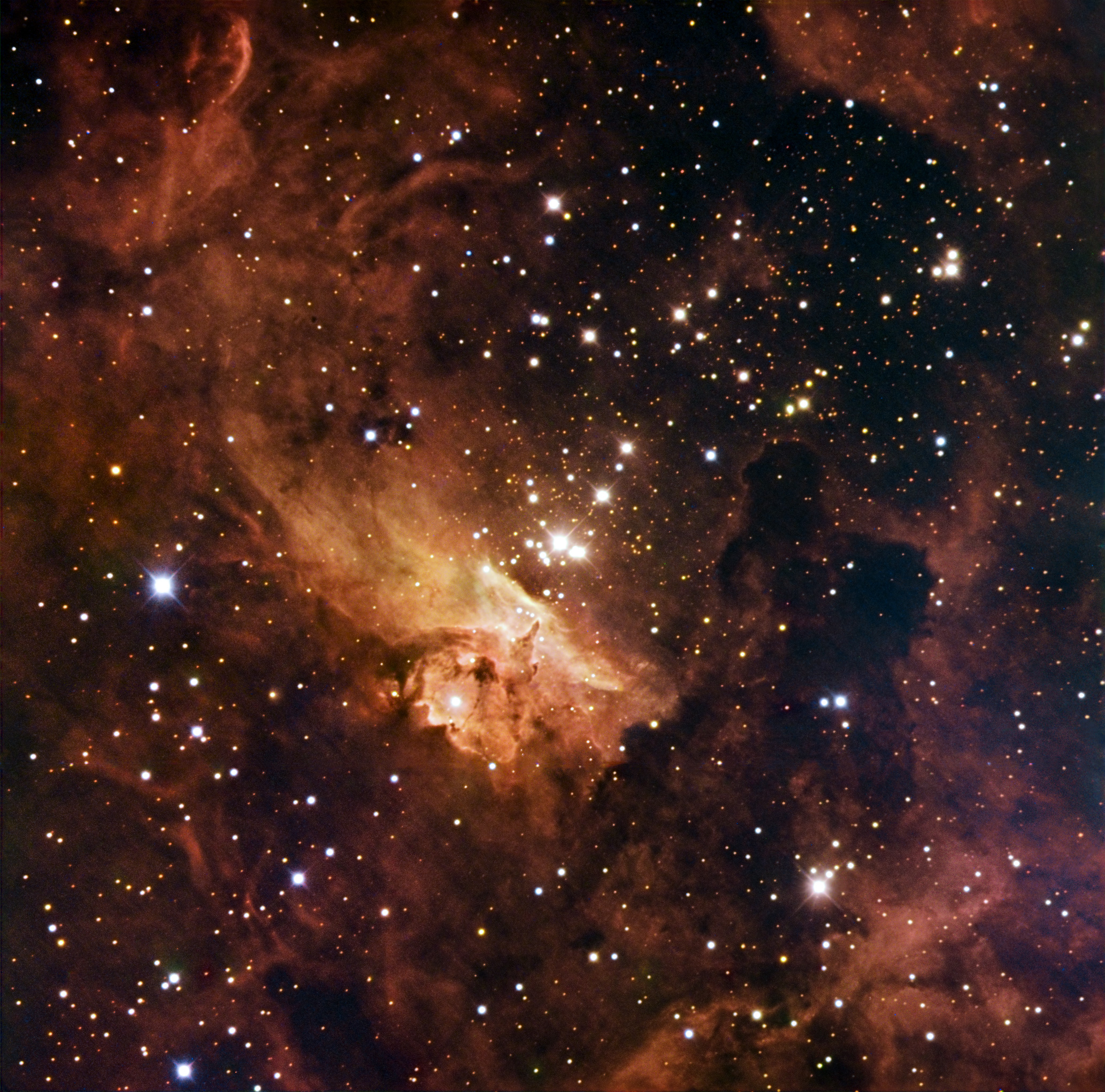 A dense star field with bright and faint stars scattered among colorful cosmic gas and dust clouds in deep space, as seen by JWST and Hubble near the Pismis 24 cluster.