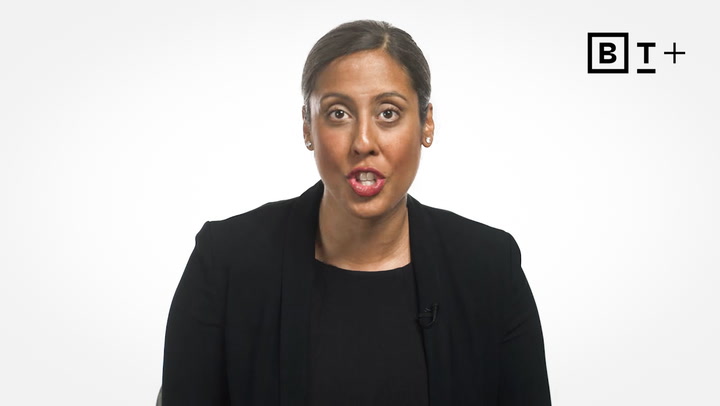 A woman in a black blazer speaks while facing the camera, with a BT+ logo displayed in the top right corner against a white background.