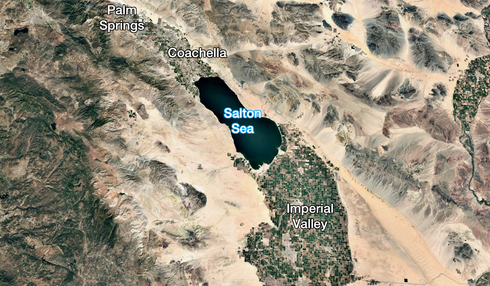 Satellite image showing the Salton Sea in Southern California, with nearby areas labeled Palm Springs, Coachella, and Imperial Valley.