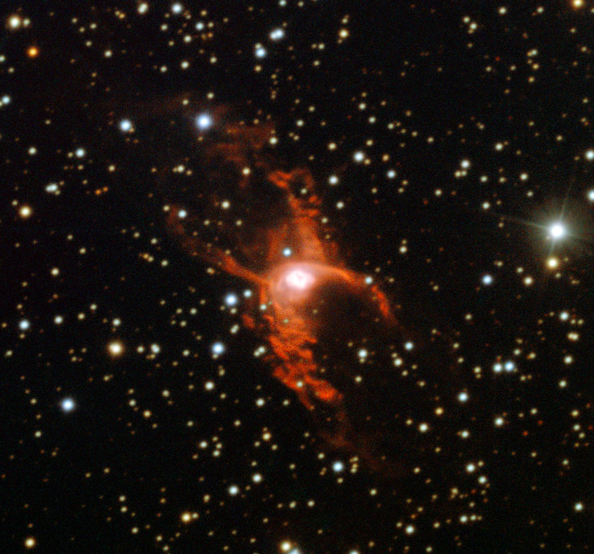 A bright orange-red nebula with a glowing core is surrounded by numerous white stars scattered across a dark space background.